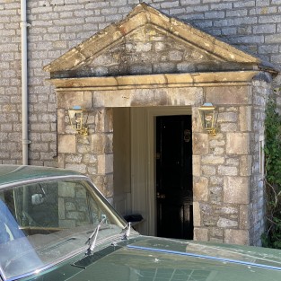 Kemble Wall Lantern in Polished Brass Unlacquered Finish
